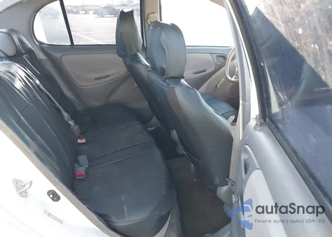 2000 Toyota Echo из США, поврежденный, VIN JTDBT1230Y0083745